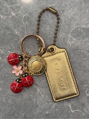 Coach Gold Leather Hang Tag with Accessories 🐞